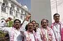 TRS MLAs shout slogans during a demonstration demanding separate statehood for Telangana outside the Andhra Pradesh legislative assembly in Hyderabad on Tuesday. PTI Photo