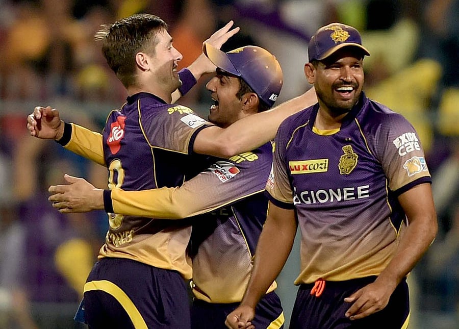 Woakes jubiliate with his teammates after the dismissal of RCB batsman Stuart Binny during IPL Match in Kolkata on Sunday. PTI Photo