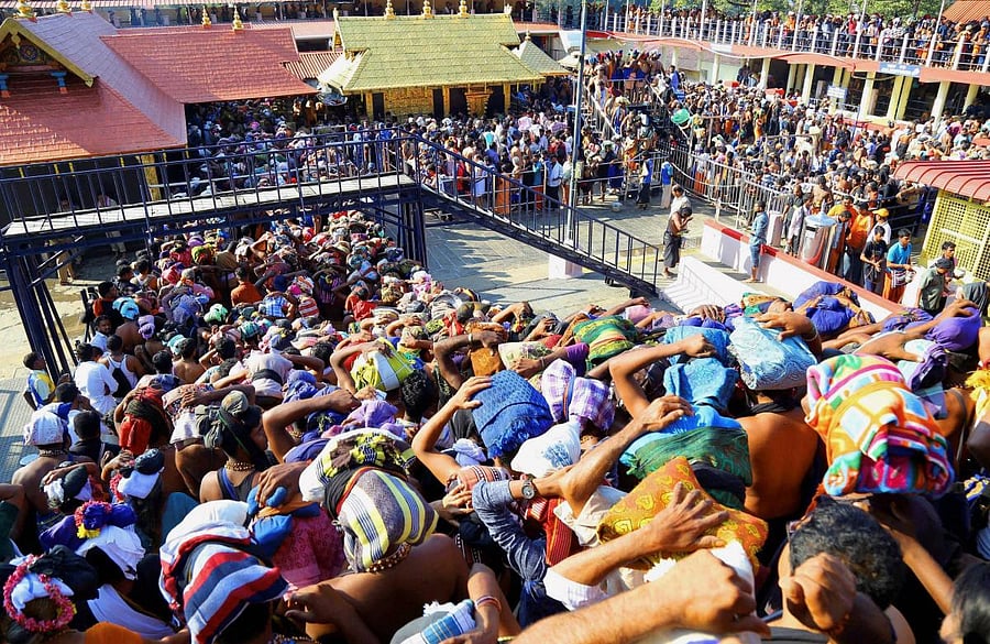 Devotees gather at the Sabarimala Lord Ayyappa Temple in Pathanamthitta, Kerala