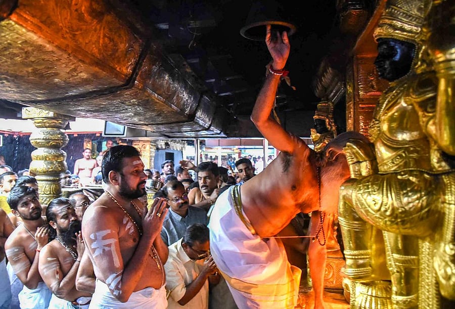 The temple opened on Friday amid a tense standoff involving social activist Trupti Desai in Kochi and a move by its administrator to seek time from the Supreme Court to implement its verdict. PTI Photo