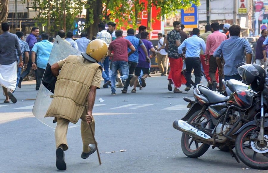 Protestors turned violent at many places and attacked shops and buses. Kerala State RTC stopped services as around 50 buses were damaged by the protestors. (PTI)