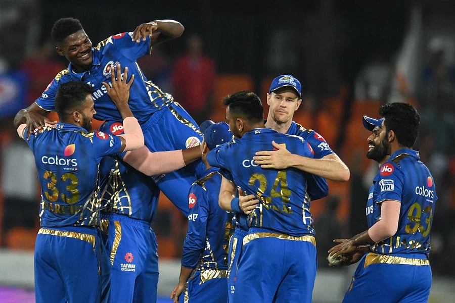 HEROIC: Mumbai Indians' Alzarri Joseph (centre) is lifted by his team-mates during their game against Sunrisers Hyderabad. AFP 
