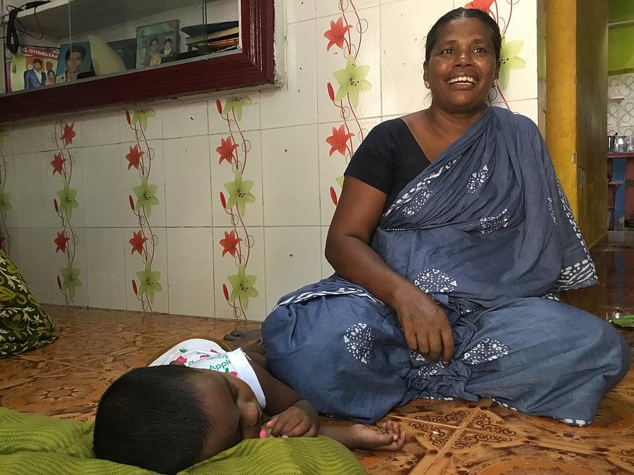 Vanitha, Snowlin's mother, putting her grand daughter Jibansi to sleep at her house in Thoothukudi. (DH photo by ETB Sivapriyan)