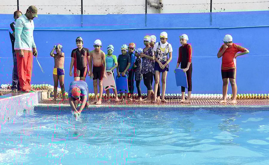 Kids this summer season are learning Swimming, etiquette, manners, developing apps etc. Photo/ B H Shivakumar