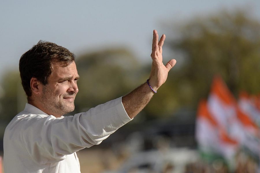 Rahul Gandhi reached the Collectorate to file his papers after a roadshow through the town. PTI File photo