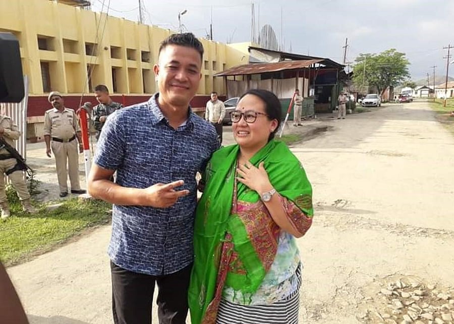 Kishorechandra Wangkhem with his wife outside Sajiwa jail in Imphal on Wednesday. Photo by V. Thockchom.