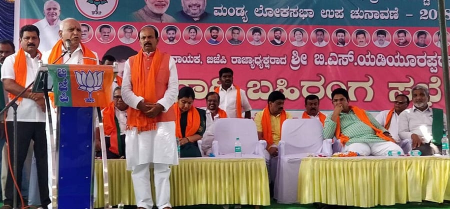 BJP state president B S Yeddyurappa addresses party workers during a campaign for Lok Sabha by-elections at Srirangapatna, Mandya district, on Tuesday.