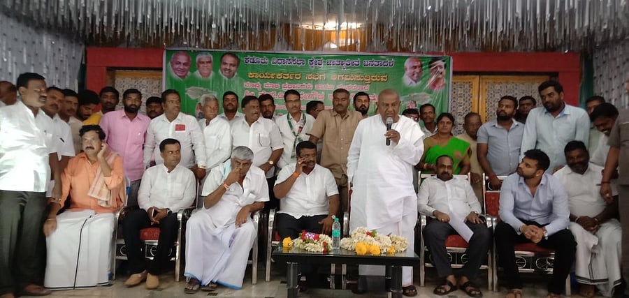Hassan MP and JD(S) Supremo H D Deve Gowda addresses party workers in Kadur on Thursday.
