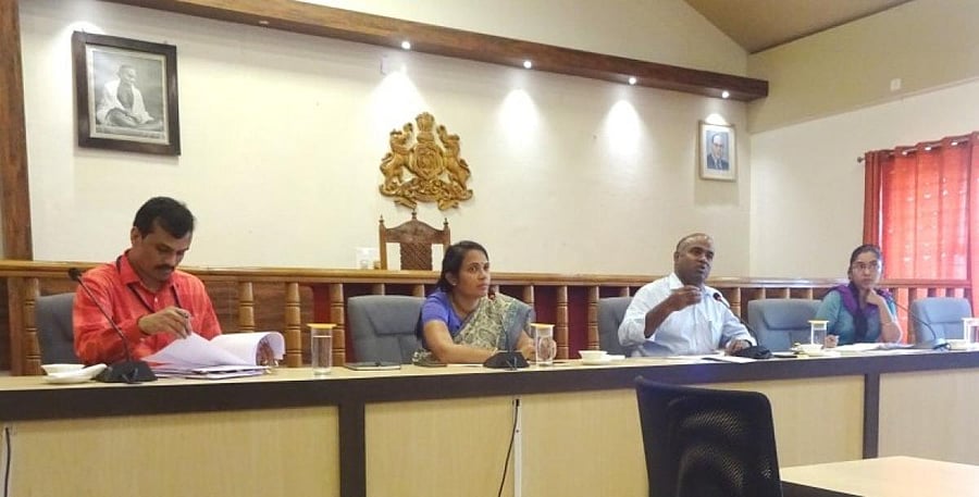 District In-charge Secretary V Anbu Kumar chairs a progress review meet at the DC’s office on Thursday.