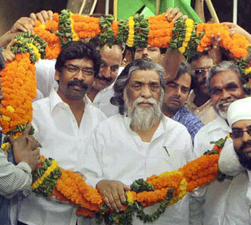 JMM chief Shibu Soren and his son & party leader Hemant Soren PTI File