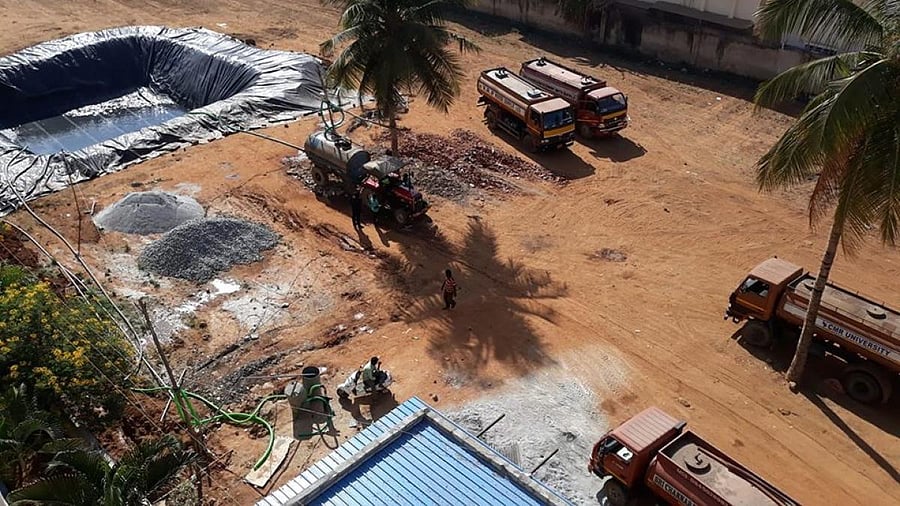 Unauthorised water tanker enterprises are setting up large temporary tanks to store water in Ramagondanahalli.