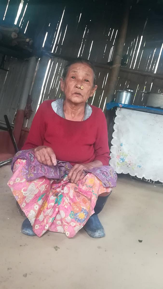 An elderly worker of Dooteriah Tea Garden.