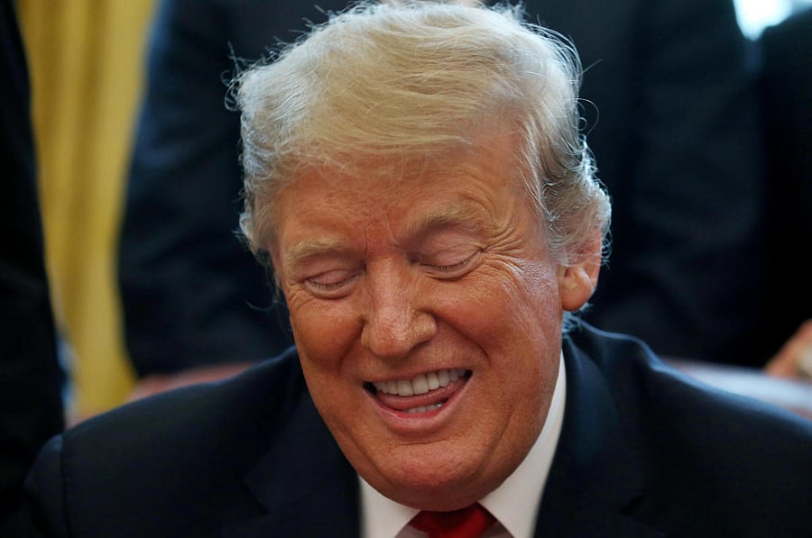 U.S. President Donald Trump hosts the 2018 Stanley Cup champions: the Washington Capitals in the Oval Office of the White House in Washington, U.S. March 25, 2019. REUTERS/Leah Millis