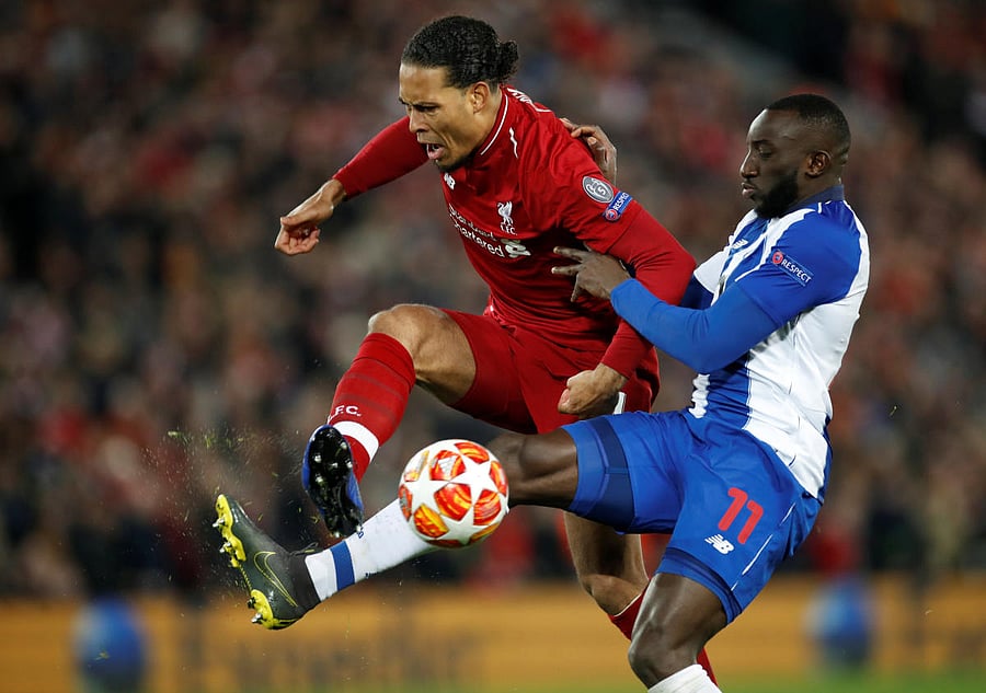 BATTLING STRIKER: FC Porto's Moussa Marega (right) was a thorn in Liverpool's side in the first leg. Reuters