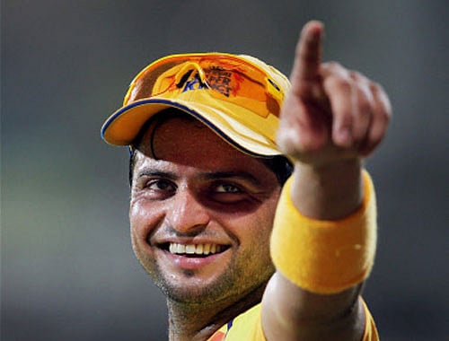 Chennai Super Kings' Suresh Raina celebrates the team's win over Delhi Daredevils in the IPL match at MA Chidambaram Stadium in Chennai on Tuesday. PTI Photo