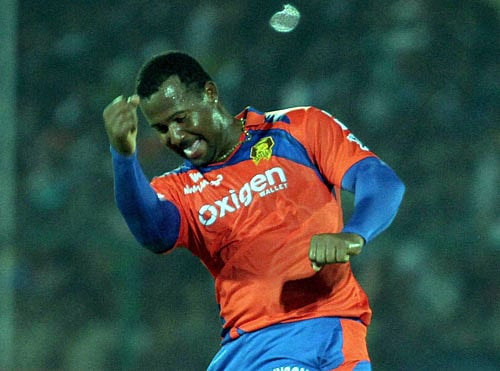 Gujarat Lions' bowler Dwayne Smith celebrates after taking wicket of Sakib al Hasan of Kolkata Knight Riders during an IPL 2016 match at Green Park Stadium in Kanpur on Thursday. PTI Photo