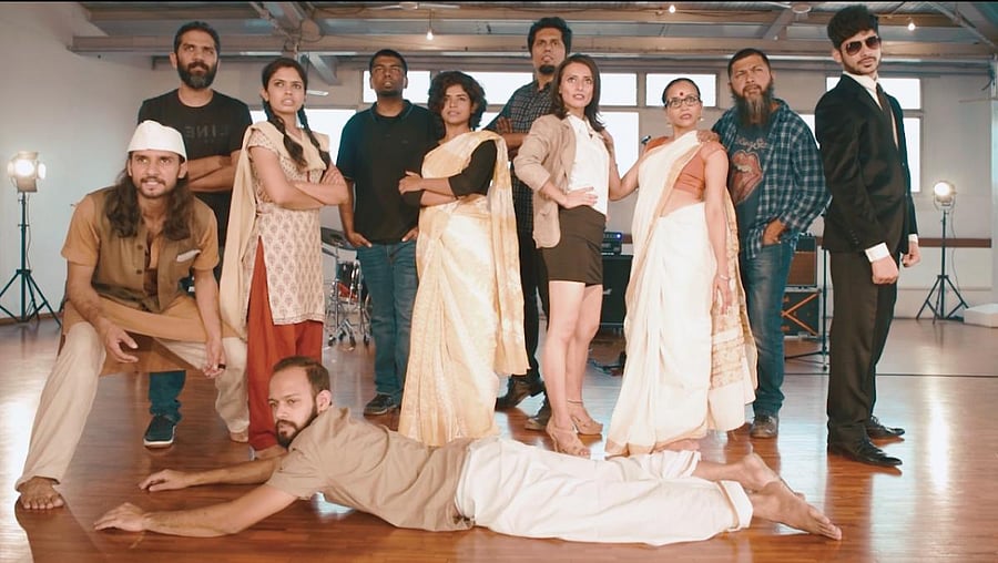 The band members of Thermal and a Quarter with dancers from Citizens of Stage Co Lab.