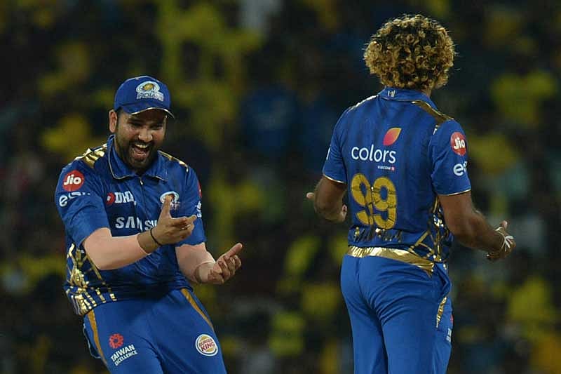 Mumbai Indian's Rohit Sharma (left) and Lasith Malinga celebrate the dismissal of Chennai Super Kings' Shane Watson in Chennai on Friday. AFP