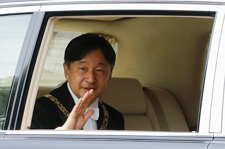 Naruhito promised to "bear in mind the path trodden by past emperors" and devote himself to "self-improvement". Reuters photo