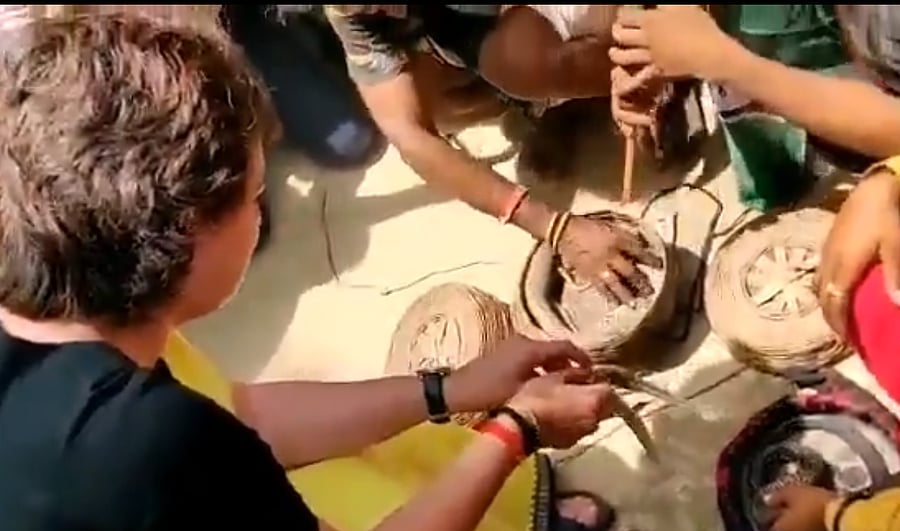 Congress leader Priyanka Gandhi Vadra on Thursday met snake charmers in Raebareli constituency of Uttar Pradesh and boldly held a reptile, saying "it's fine". (Video grab)