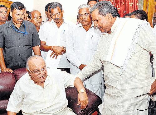 Master Hirannaiah and Siddaramaiah. File photo