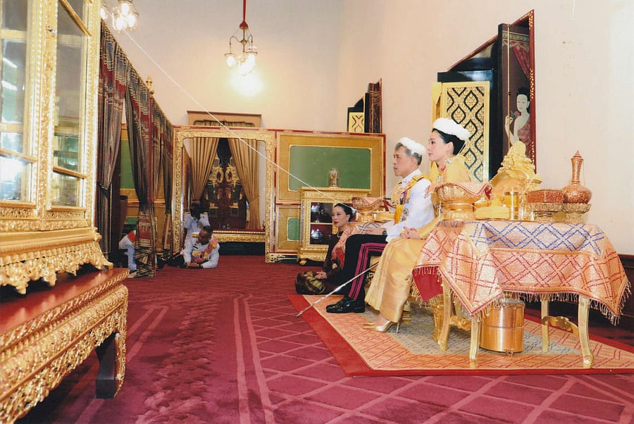 Thailand's King Maha Vajiralongkorn and Queen Suthida attend a religious ceremony for the coronation inside the Grand Palace in Bangkok. Reuters