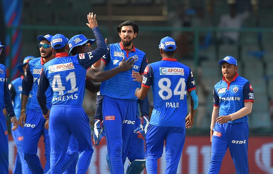 Delhi Capitals' Ishant Sharma (centre) celebrates with his team-mates after dismissing Rajasthan Royals' batsman Liam Livingtone in New Delhi on Saturday. PTI