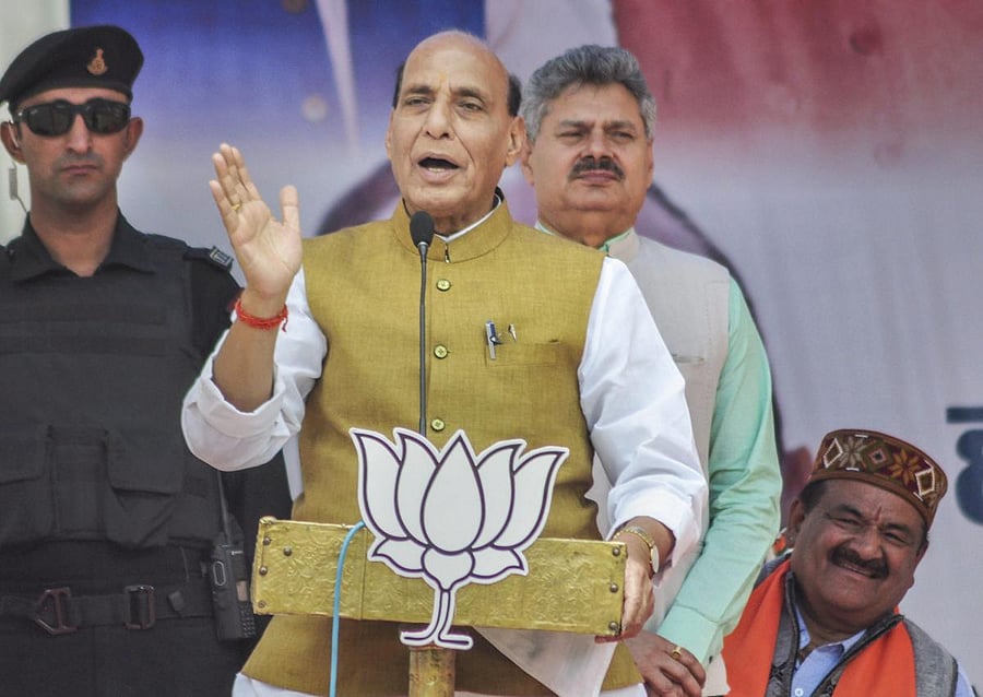 Kullu: Union Minister and BJP leader Rajnath Singh address an election rally ahead of the last phase of the Lok Sabha polls, in Kullu district, Thursday, May 16, 2019. (PTI Photo)