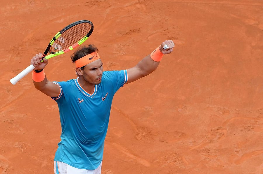 Rafael Nadal of Spain celebrates after winning against Greece's Stefanos Tsitsipas during their ATP Masters tournament semi-final tennis match at the Foro Italico camp in Rome. AFP photo