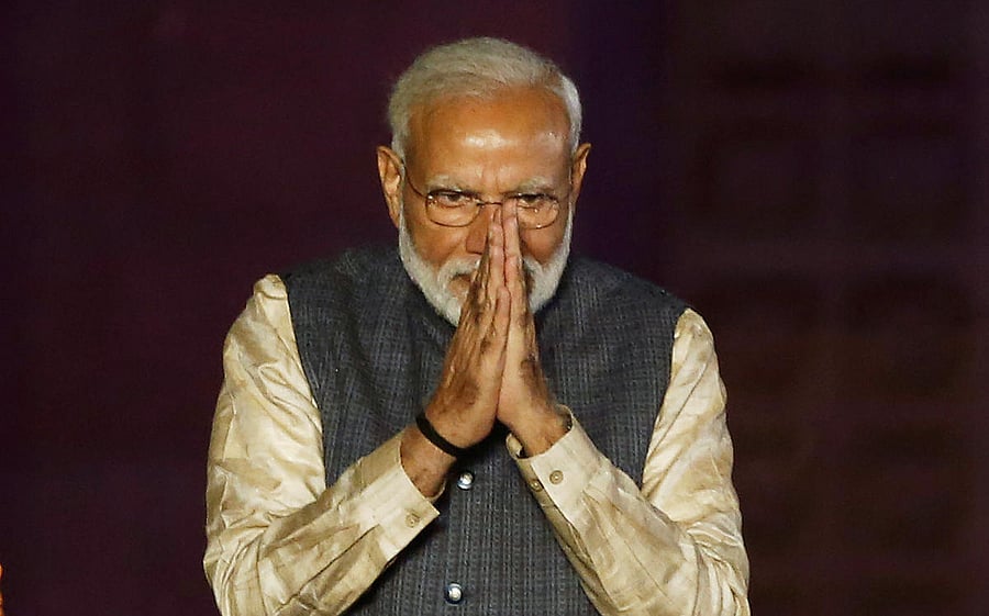 Indian Prime Minister Narendra Modi greets his supporters after the election results at Bharatiya Janata Party (BJP) headquarter in New Delhi. Reuters photo