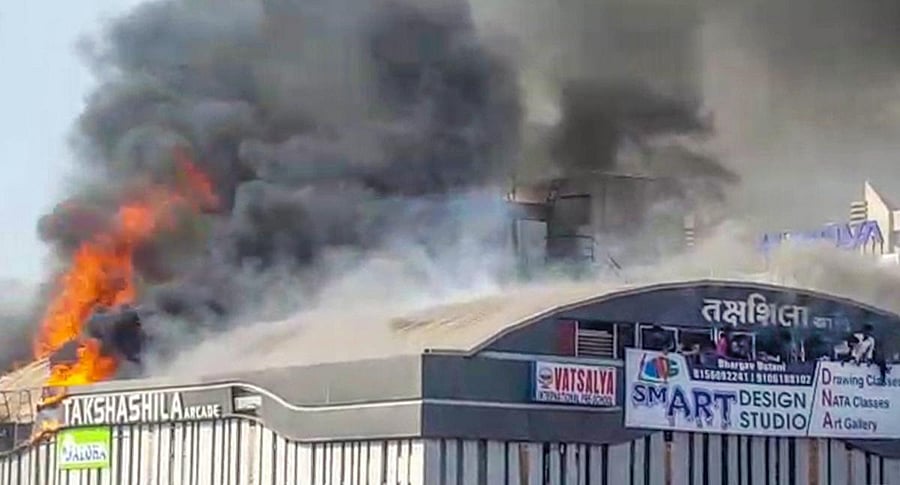 It has been found that not only the top floor of the building was illegally constructed but a staircase, which could have saved many lives, had been blocked. PTI Photo