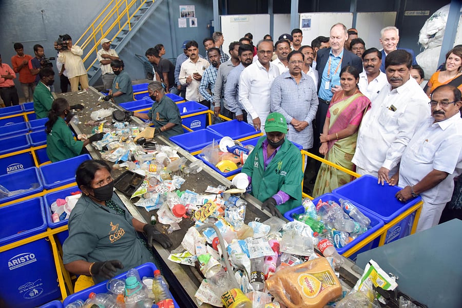 Deputy Chief Minister G Parameshwara and delegates from Netherlands at a waste segregation centre on Friday. DH Photo/B H Shivakumar