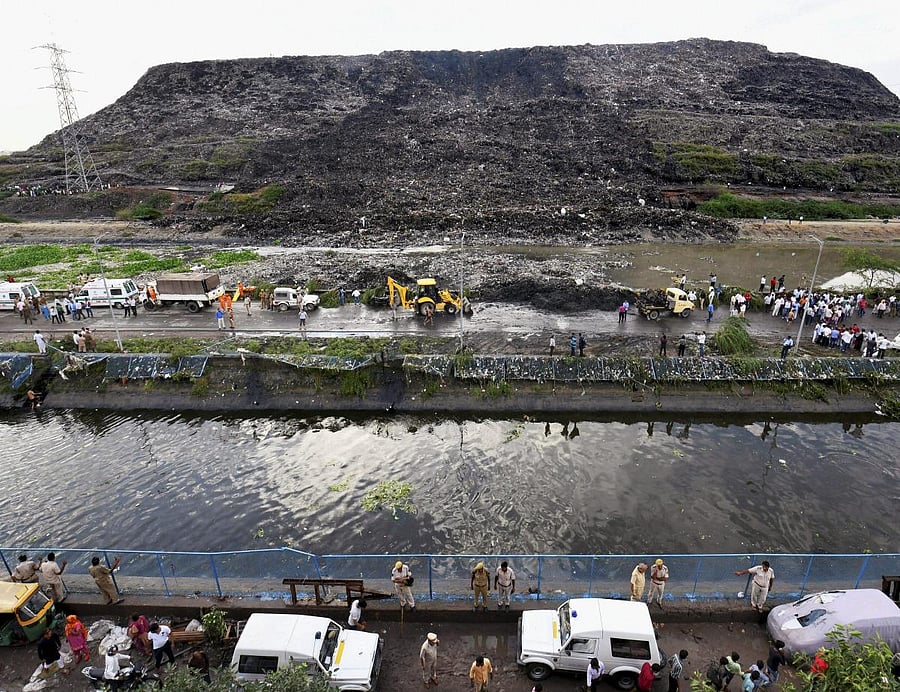 Taking up the area of more than 40 football pitches, Ghazipur rises by nearly 10 metres a year with no end in sight to its foul-smelling growth. AFP Photo