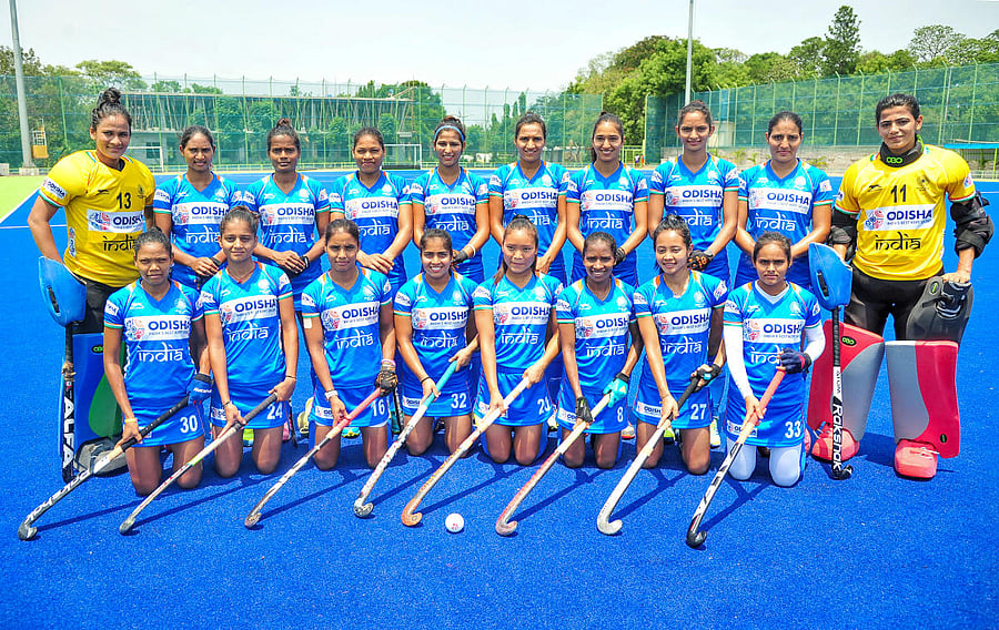 Indian Women hockey players don their new jersey as they pose for a group photo during a practice session ahead of the FIH Women's Series finals, at Sports Authority of India (SAI). (PTI File Photo)