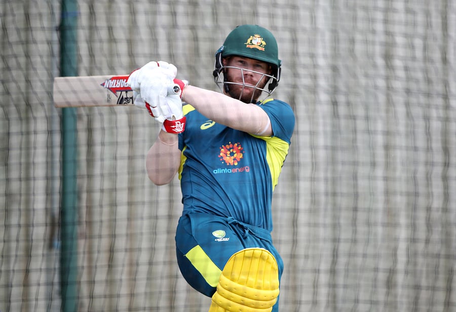 Australian opener David Warner is using a bat sensor at practice sessions. AFP