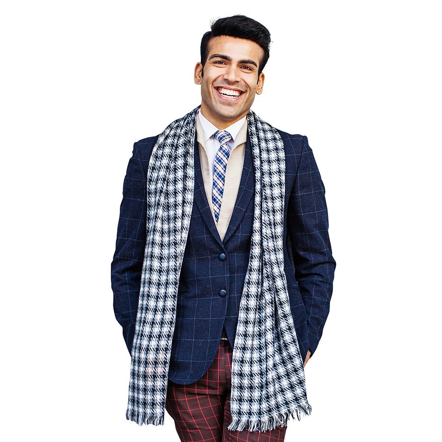 Start with a Paul Smith look. A sharply cut suit in a modern colour like ultramarine blue teamed with an iconic striped shirt and shoes that match