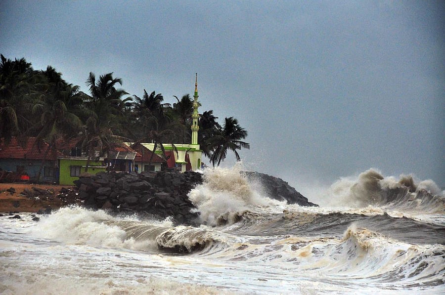Sea waves threaten houses situated on the shore in Ullal on Monday.