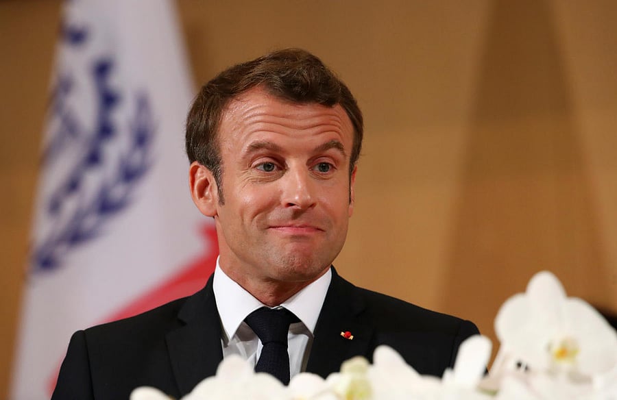 The oak died during the quarantine it was put in just after being symbolically planted by Macron and Trump in the White House's gardens. (Reuters Photo)