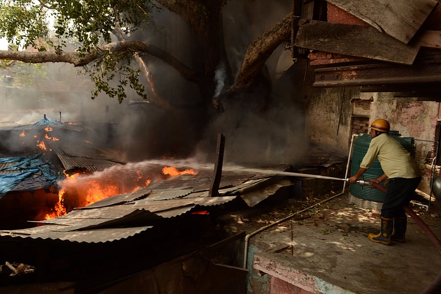 Hundreds of people from Bela Pahada and other nearby villages have been flocking the area to witness the billowing smoke. (PTI Photo)