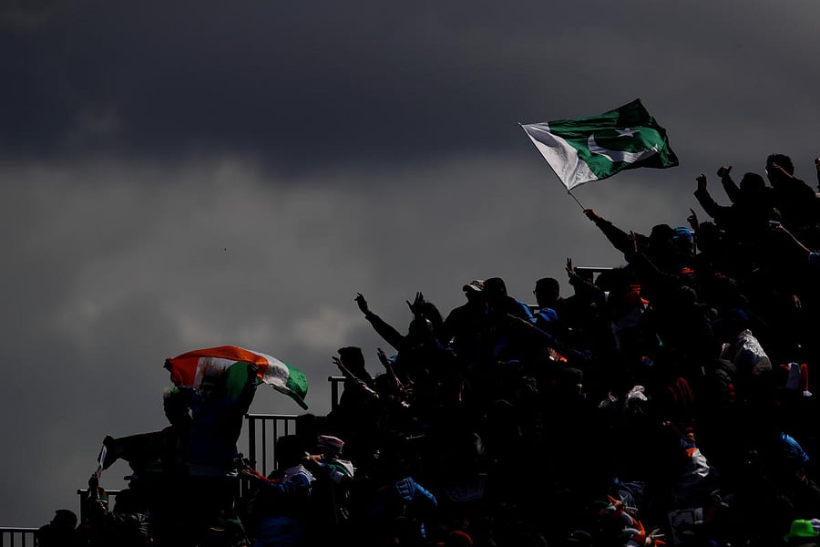 India and Pakistan fans wave flags. (Reuters)