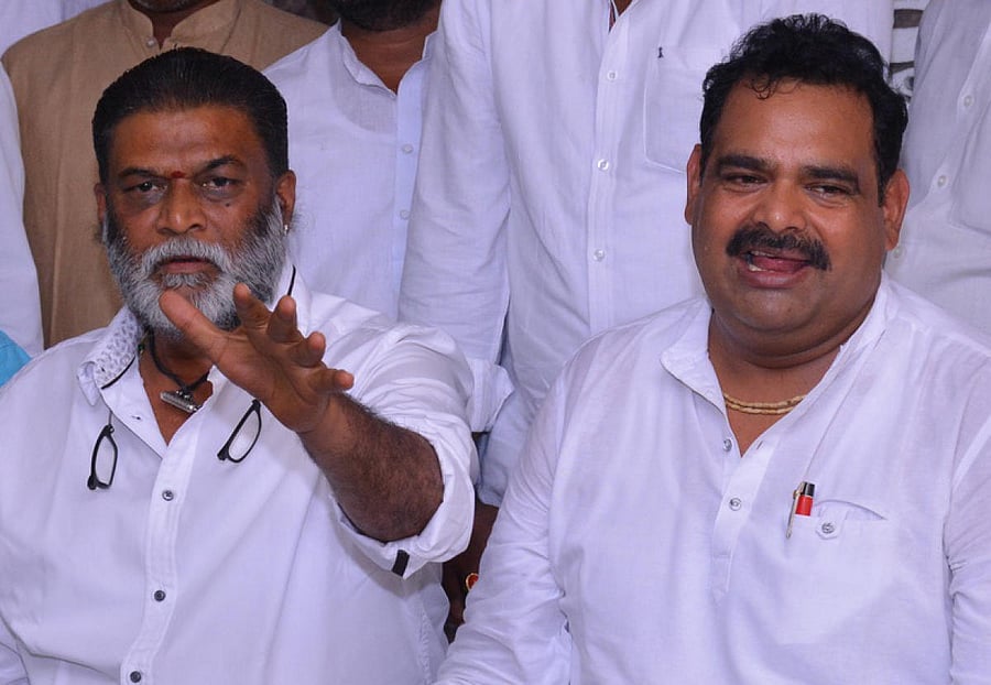 MLA Anand Singh and Congress leader Anil Lad address a press meet