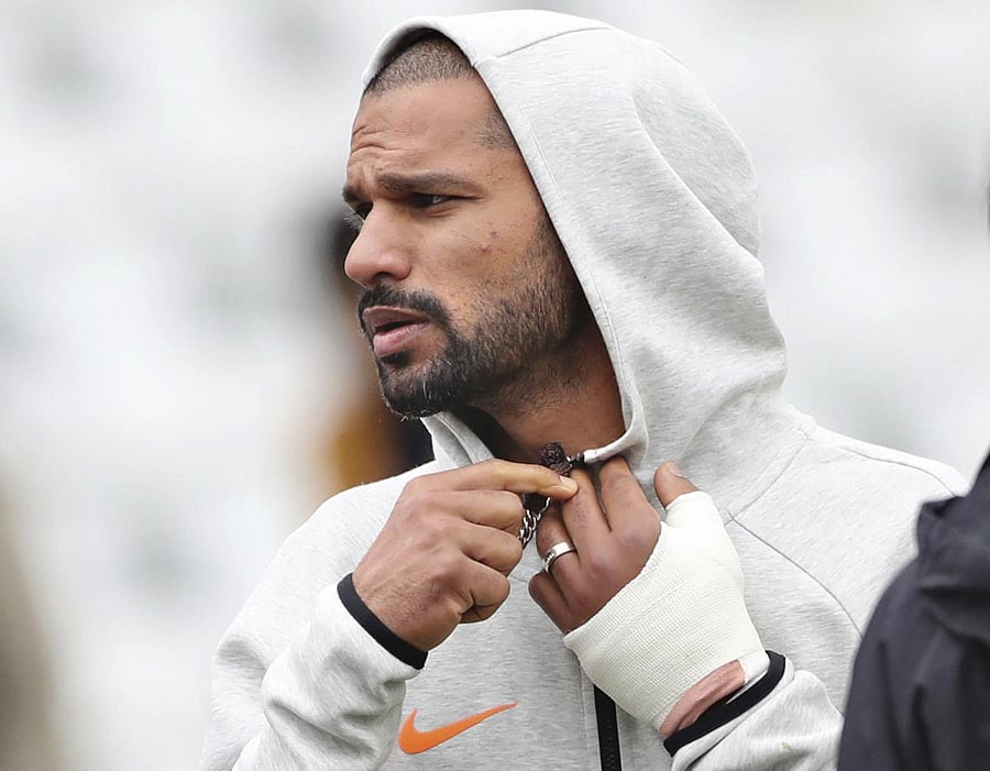 Shikhar Dhawan with his injured thumb. Credit: AP/PTI