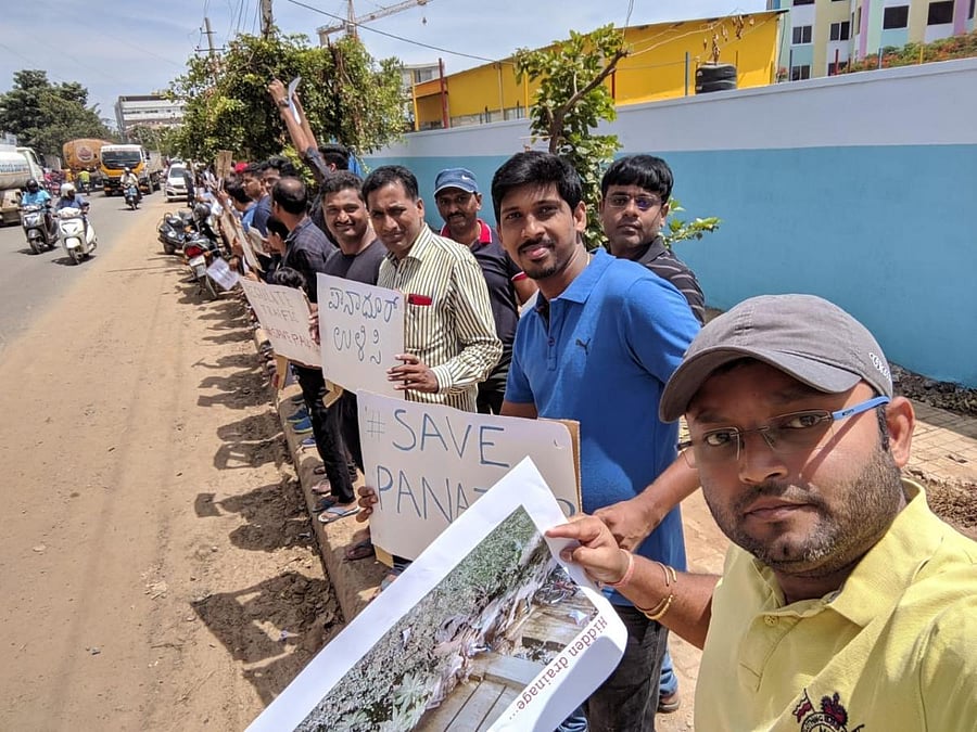 Residents of Panathur recently formed a human chain, holding placards and listing their civic problems.