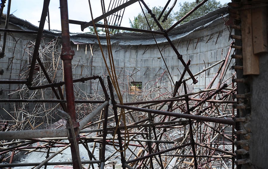 The fallen roof at the biodigester (tank) at the BWSSB sewage treatment plant near Hebbal. DH PHOTO/PUSHKAR V