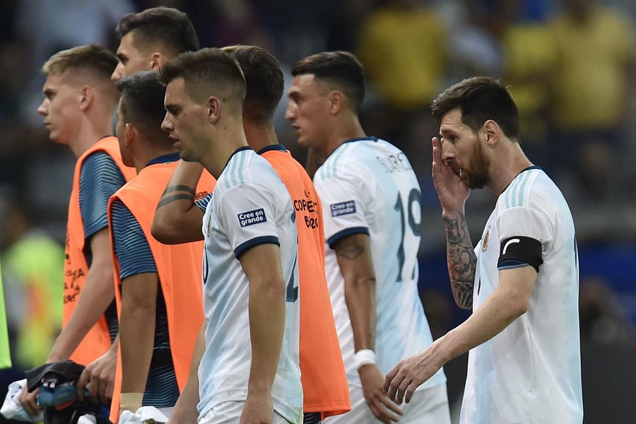 Argentina's Lionel Messi (R) is pictured after tying 1-1 with Paraguay in their Copa America football tournament group match at the Mineirao Stadium in Belo Horizonte, Brazil, on June 19, 2019. (AFP)