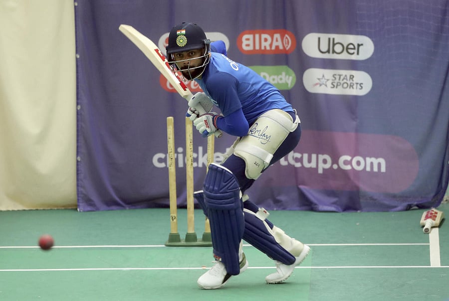 Indian skipper Virat Kohli is concentration personified as he bats during Tuesday's optional practice session in Manchester. AP/PTI