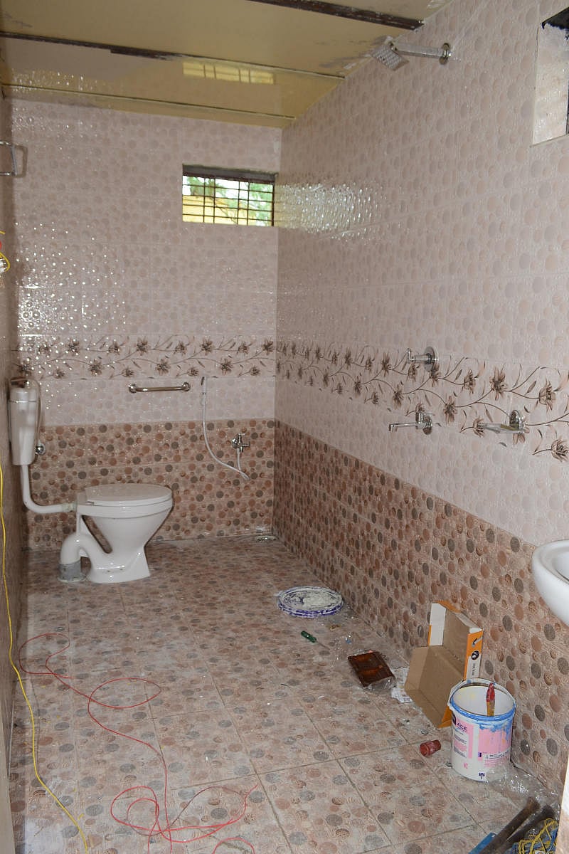 The newly constructed toilet at government higher primary school in Karegudda village of Manvi taluk, Raichur district, ahead of chief minister's Grama Vastavya in the school. DH Photo