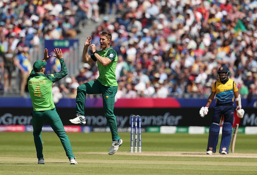 South Africa's Dwaine Pretorius celebrates taking the wicket of Sri Lanka's Kusal Mendis. Photo credit: Reuters