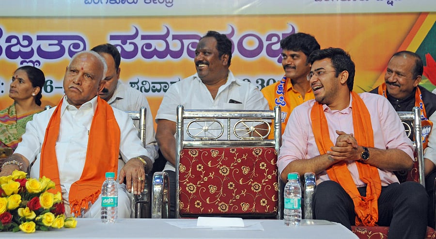 Karnataka BJP president B S Yeddyurappa and Bangalore South MP Tejasvi Surya at an event to felicitate the newly elected BJP MPs in Bengaluru on Saturday.