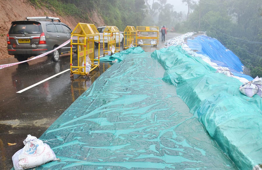 Barricades have been placed on Madikeri-Mangaluru highway to restrict the movement of vehicles on one side of the road, as the NH has developed a crack.